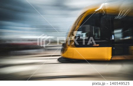 Modern Tram Rushing Through Budapest City Streets Modern Tram Rushing Through Budapest City Streets 140549525
