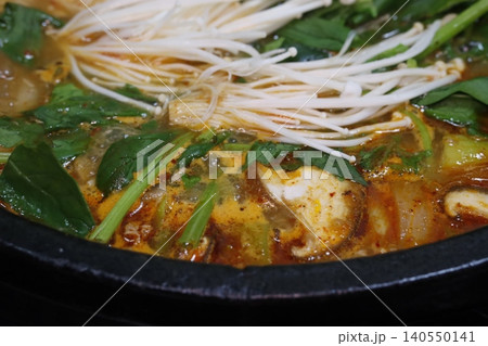Steaming Hot Pot with Mushrooms and Greens Steaming Hot Pot with Mushrooms and Greens 140550141