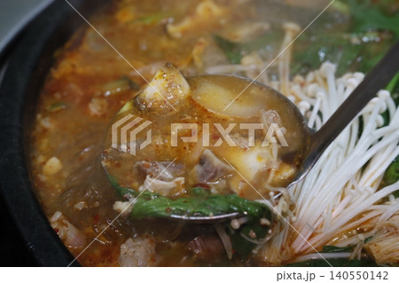 Steaming Hot Pot with Mushrooms and Greens Steaming Hot Pot with Mushrooms and Greens 140550142
