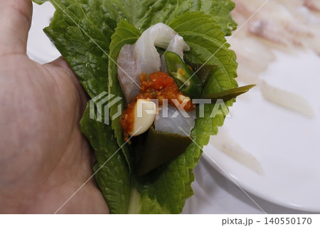 Fresh Leaf-Wrapped Seafood Appetizer Fresh Leaf-Wrapped Seafood Appetizer 140550170
