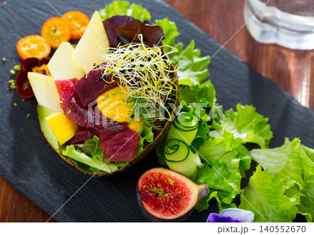 Salad with tuna, mango and avocado Salad with tuna, mango and avocado 140552670