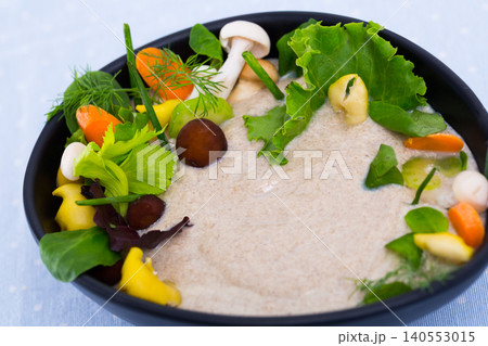 Cream soup with mushrooms and vegetables Cream soup with mushrooms and vegetables 140553015