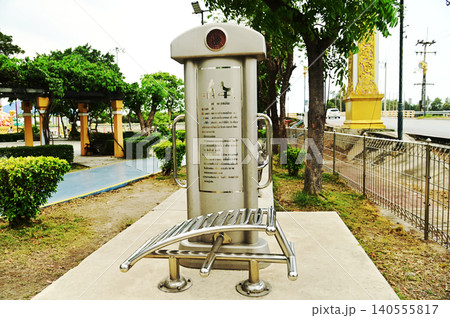 A variety of stainless steel exercise equipment is available for users to enjoy in Bang Sai Park, a local public park. A variety of stainless steel exercise equipment is available for users to enjoy in Bang Sai Park, a local public park. 140555817