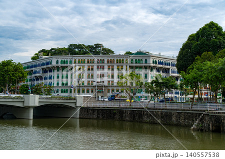 SINGAPORE - JUNE 29, 2025: Wide view of the historic Old Hill Street Police Station featuring its iconic rainbow colored window shutters SINGAPORE - JUNE 29, 2025: Wide view of the historic Old Hill Street Police Station featuring its iconic rainbow colored window shutters 140557538