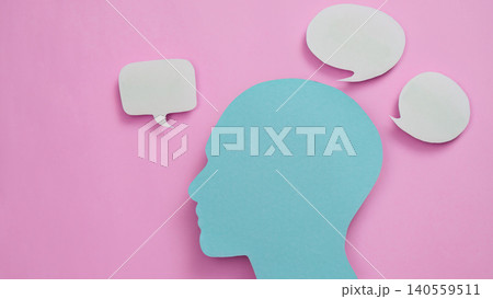 Human head silhouette with speech bubbles representing thoughts and ideas Human head silhouette with speech bubbles representing thoughts and ideas 140559511