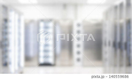Blurred bright modern data center room featuring metal server racks containing digital internet computing hardware creating abstract tech cyber web hosting background Blurred bright modern data center room featuring metal server racks containing digital internet computing hardware creating abstract tech cyber web hosting background 140559686