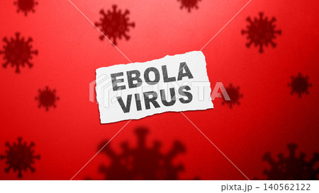 A piece of torn white paper with the words Ebola Virus written on it, placed on a red textured background featuring virus silhouettes A piece of torn white paper with the words Ebola Virus written on it, placed on a red textured background featuring virus silhouettes 140562122