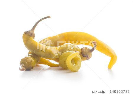 Pickled Banana Peppers and Pepperoncini Close-Up on White Background for Salad and Condiment Use Pickled Banana Peppers and Pepperoncini Close-Up on White Background for Salad and Condiment Use 140563782
