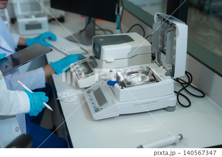 Chemist scientist or doctor working in research laboratory, medical analysis, documents, scientific study. Chemist scientist or doctor working in research laboratory, medical analysis, documents, scientific study. 140567347