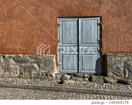 Wooden Timeworn Door of Entrance to Old House. 140569176