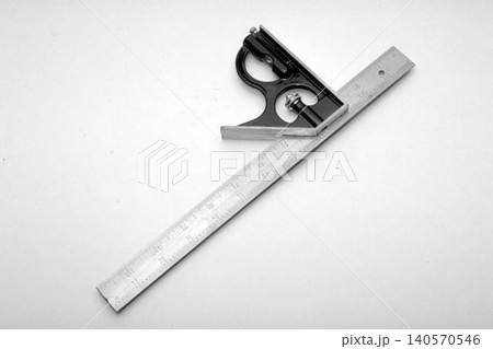 A realistic image of a Combination Square with Steel Ruler and Adjustable Head A realistic image of a Combination Square with Steel Ruler and Adjustable Head 140570546