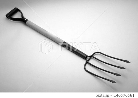 A realistic image of a Garden Fork isolated on a white background A realistic image of a Garden Fork isolated on a white background 140570561