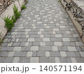Cobblestone Paved Sidewalk in Urban City Street 140571194