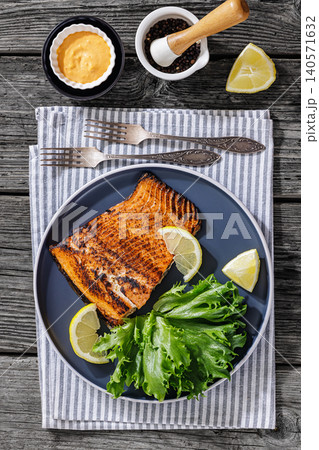 BBQ salmon fish on plate with fresh salad BBQ salmon fish on plate with fresh salad 140571632