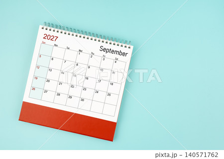 September 2027 desk calendar on blue background for your appointment. 140571762