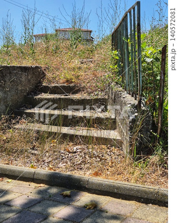 Staircase to nowhere. Abandoned place. Unfinished staircase. old stone staircase in the park Staircase to nowhere. Abandoned place. Unfinished staircase. old stone staircase in the park 140572081