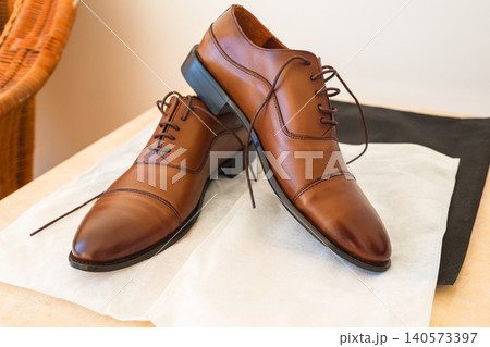 A pair of new men's leather boots, photos from different angles 140573397