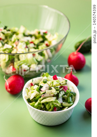 fresh colorful vegetable salad with green onion and pepper 140574399