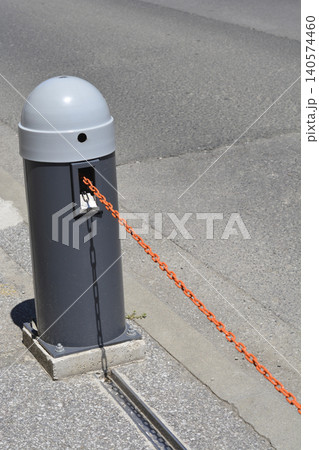 Automatic Chain Barrier Post with Orange Metal Chain 140574460