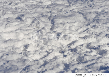 Textured deep snow surface background Textured deep snow surface background 140574462