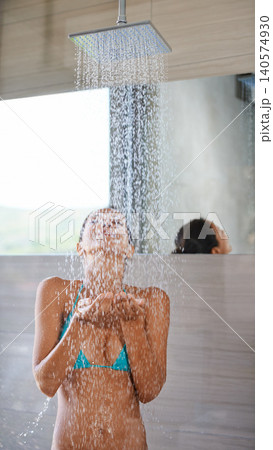 Showering, wet and woman with wellness, bikini and healthy with morning routine and body. Person, hotel and girl with water and underwear with cleaning, grooming and happy with hospitality and liquid Showering, wet and woman with wellness, bikini and healthy with morning routine and body. Person, hotel and girl with water and underwear with cleaning, grooming and happy with hospitality and liquid 140574930