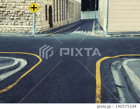 Crossroads, intersection at road for travel direction in city or decision choice for pathway journey, symbol sign or navigation. Street, four way and outdoor location or London, adventure or building 140575104