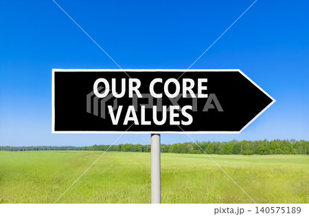 Our core values words symbol. Concept words Our core values on beautiful black road sign. Beautiful blue sky green field background. Business our core values motivational support concept. Copy space. Our core values words symbol. Concept words Our core values on beautiful black road sign. Beautiful blue sky green field background. Business our core values motivational support concept. Copy space. 140575189