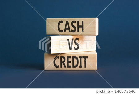 Cash vs credit words symbol. Concept words Cash vs credit on beautiful wooden blocks. Beautiful grey background. Business and cash vs credit concept. Copy space. Cash vs credit words symbol. Concept words Cash vs credit on beautiful wooden blocks. Beautiful grey background. Business and cash vs credit concept. Copy space. 140575640