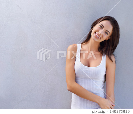 Happy, portrait and woman with casual fashion or outfit for relaxed look, comfort and style for leisure. Female person, classic and tank top, isolated on grey background or wall for mockup space Happy, portrait and woman with casual fashion or outfit for relaxed look, comfort and style for leisure. Female person, classic and tank top, isolated on grey background or wall for mockup space 140575939
