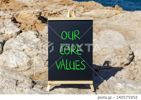 Our core values words symbol. Concept words Our core values on beautiful black blackboard. Beautiful stone background. Business our core values motivational support concept. Copy space. Our core values words symbol. Concept words Our core values on beautiful black blackboard. Beautiful stone background. Business our core values motivational support concept. Copy space. 140575958