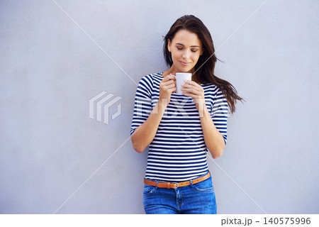 Woman, student and standing with coffee, break and calm with smile and happiness. Relax, energy or confident female person with beverage cup outside, espresso or latte for drinking and start of day Woman, student and standing with coffee, break and calm with smile and happiness. Relax, energy or confident female person with beverage cup outside, espresso or latte for drinking and start of day 140575996