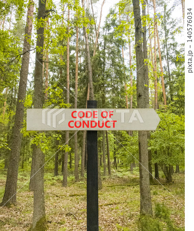 Code of conduct words symbol. Concept words Code of conduct on beautiful yellow road sign. Beautiful grey forest background. Business Code of conduct concept. Copy space. Code of conduct words symbol. Concept words Code of conduct on beautiful yellow road sign. Beautiful grey forest background. Business Code of conduct concept. Copy space. 140576034