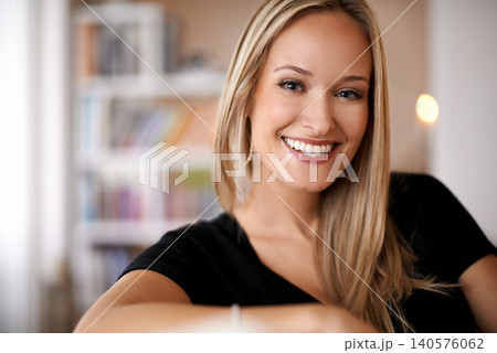 Face, woman and happy in living room or home for leisure, break and enjoy in couch. Female person, smile and satisfied with comfort or joy in lounge, sofa and positivity for self care in portrait. 140576062