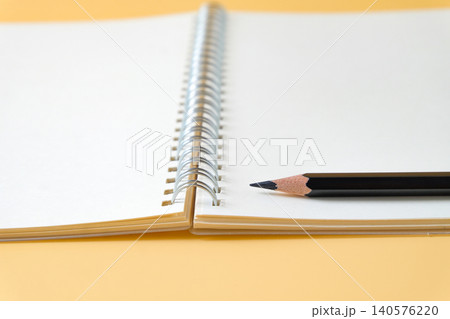 Pencil on spiral-bound book note ,education concept. Pencil on spiral-bound book note ,education concept. 140576220