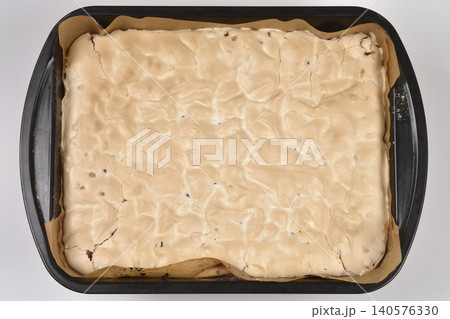Freshly Baked Meringue Cake in Baking Pan Top View Freshly Baked Meringue Cake in Baking Pan Top View 140576330