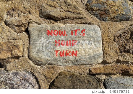 Now it's your turn words symbol. Concept words Now it's your turn on beautiful grey stone. Beautiful stone wall background. Business Now it's your turn motivational support concept Copy space 140576731