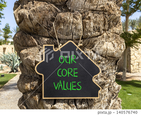 Our core values words symbol. Concept words Our core values on beautiful black blackboard. Beautiful palm tree background. Business our core values motivational support concept. Copy space. Our core values words symbol. Concept words Our core values on beautiful black blackboard. Beautiful palm tree background. Business our core values motivational support concept. Copy space. 140576740