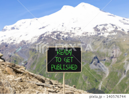 Ready to get published words symbol. Concept words Ready to get published on beautiful black blackboard. Beautiful Elbrus background. Business ready to get published motivational concept. Copy space. 140576744