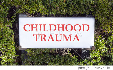 Childhood trauma words symbol. Concept words Childhood trauma on beautiful white sign plate. Beautiful green trees background. Psychological childhood trauma support concept. Copy space. Childhood trauma words symbol. Concept words Childhood trauma on beautiful white sign plate. Beautiful green trees background. Psychological childhood trauma support concept. Copy space. 140576816