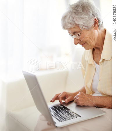 Senior woman, laptop and home planning for reading, typing or search an ebook on internet. Happy elderly person with computer for learning, website and online crossword game for sign up information Senior woman, laptop and home planning for reading, typing or search an ebook on internet. Happy elderly person with computer for learning, website and online crossword game for sign up information 140576826