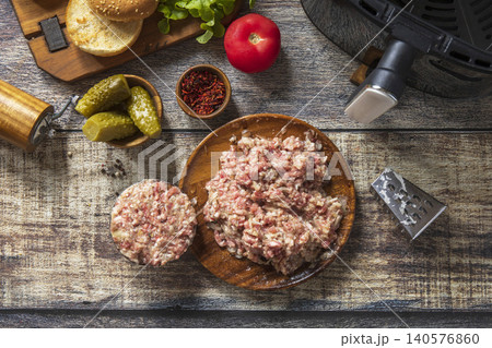 Step 5. Cooking homemade cheeseburger in kitchen gadget modern air fryer. Lifestyle trendy of new cooking. 140576860