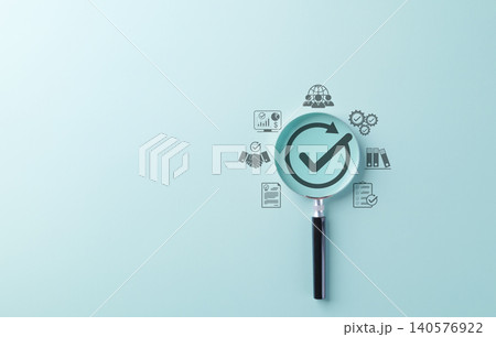 Quality Assurance and Certification Compliance Concept. A magnifying glass with checkmark surrounded by business icon, symbolizing quality assurance, compliance, and certification. certified document, 140576922