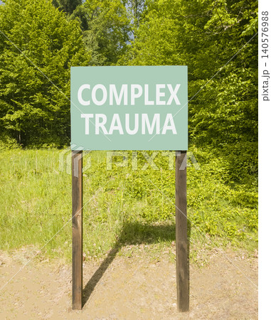 Complex trauma words symbol. Concept words Complex trauma on beautiful green road sign. Beautiful green forest background. Psychological complex trauma support concept. Copy space. Complex trauma words symbol. Concept words Complex trauma on beautiful green road sign. Beautiful green forest background. Psychological complex trauma support concept. Copy space. 140576988