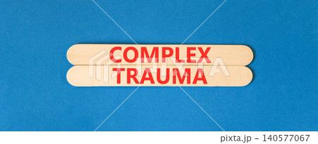 Complex trauma words symbol. Concept words Complex trauma on beautiful wooden sticks. Beautiful blue background. Psychological complex trauma support concept. Copy space. 140577067