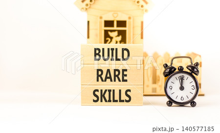 Build rare skills words symbol. Concept words Build rare skills on beautiful wooden blocks. Beautiful white background. Black alarm clock. Business and build rare skills concept. Copy space. Build rare skills words symbol. Concept words Build rare skills on beautiful wooden blocks. Beautiful white background. Black alarm clock. Business and build rare skills concept. Copy space. 140577185