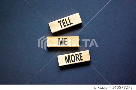 Tell me more words symbol. Concept words Tell me more on beautiful wooden blocks. Beautiful black background. Business and tell me more concept. Copy space. Tell me more words symbol. Concept words Tell me more on beautiful wooden blocks. Beautiful black background. Business and tell me more concept. Copy space. 140577273