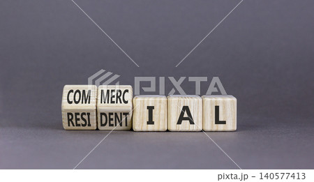 Commercial or residential symbol. Concept words Commercial or Residential on beautiful wooden blocks. Beautiful grey background. Business commercial or residential concept. Copy space. Commercial or residential symbol. Concept words Commercial or Residential on beautiful wooden blocks. Beautiful grey background. Business commercial or residential concept. Copy space. 140577413