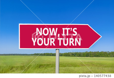 Now it's your turn words symbol. Concept words Now it's your turn on beautiful red road sign. Beautiful blue sky background. Business Now it's your turn motivational support concept Copy space 140577438