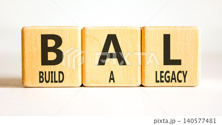 BAL build a legacy symbol. Concept words BAL build a legacy on beautiful wooden blocks. Beautiful white background. Business BAL build a legacy concept. Copy space 140577481