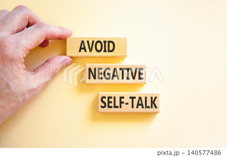 Avoid negative self-talk symbol. Concept words Avoid negative self-talk on beautiful wooden blocks. Beautiful white background. Business psychology avoid negative self-talk concept. Copy space. Avoid negative self-talk symbol. Concept words Avoid negative self-talk on beautiful wooden blocks. Beautiful white background. Business psychology avoid negative self-talk concept. Copy space. 140577486